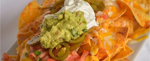 Tray of Nachos at Guadalajara Grill, Bar, & Table Side Salsa in Tucson Arizona.